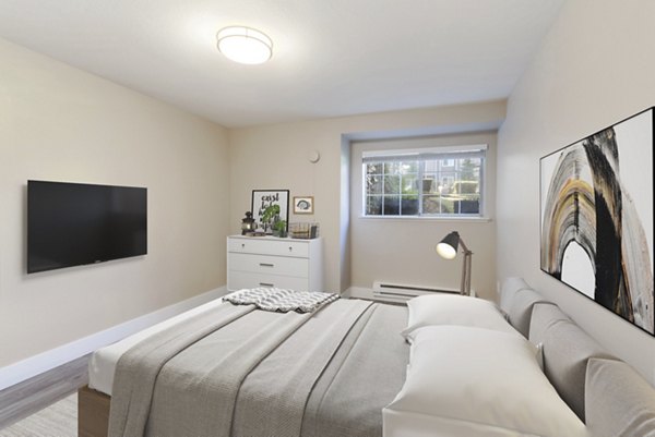 Cozy bedroom with modern decor at Avana Chestnut Hills Apartments