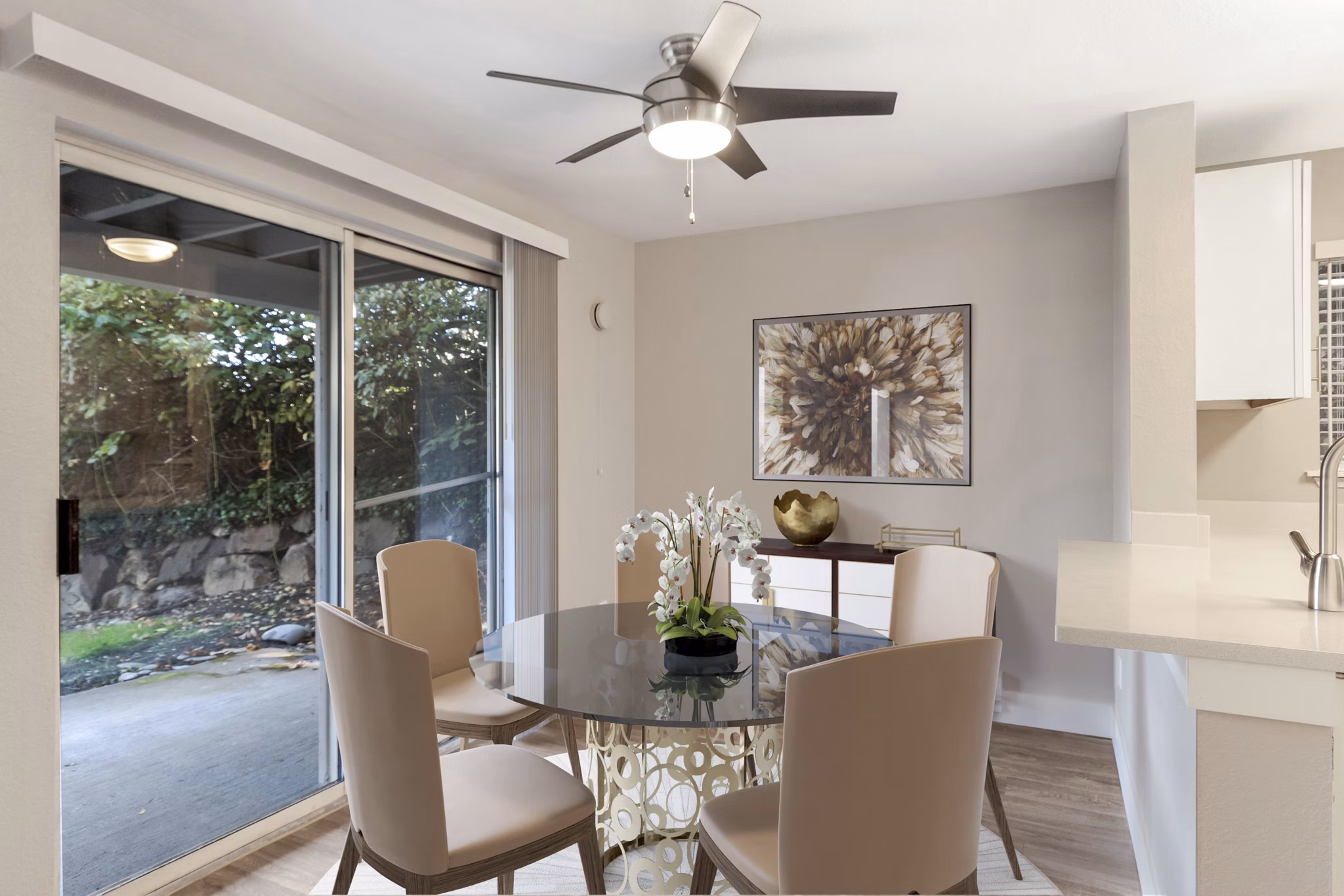 Dining area with modern decor and natural light in Avana Chestnut Hills Apartments, a Greystar luxury property