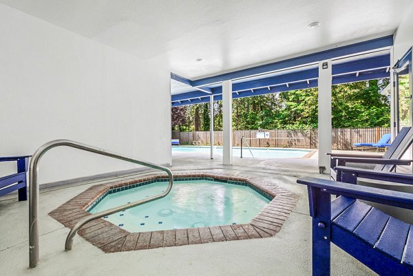 Relaxing hot tub at Avana Chestnut Hills Apartments offering a serene escape in a luxurious community environment