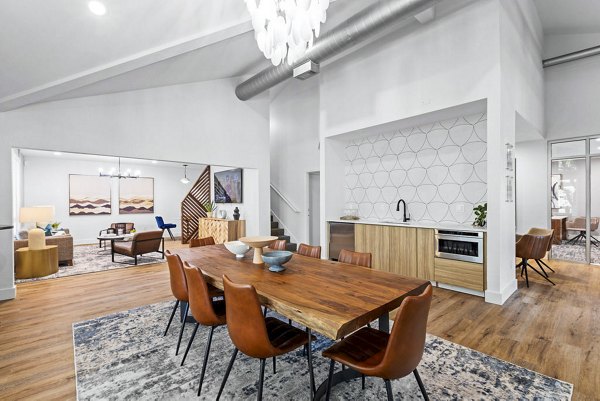 Clubhouse lobby with modern decor and ample seating at Avana Hamptons Apartments