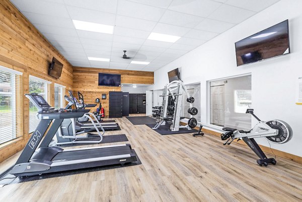 Fitness center at Avana Hamptons Apartments featuring state-of-the-art equipment and spacious workout areas in this luxury community