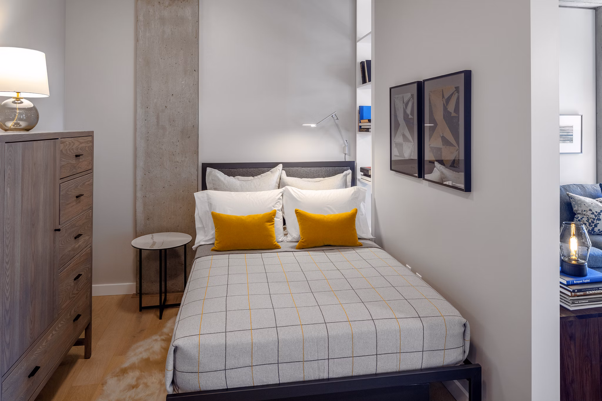 Elegant bedroom with modern furnishings at The Payton Apartments, offering luxury living spaces in a prime location