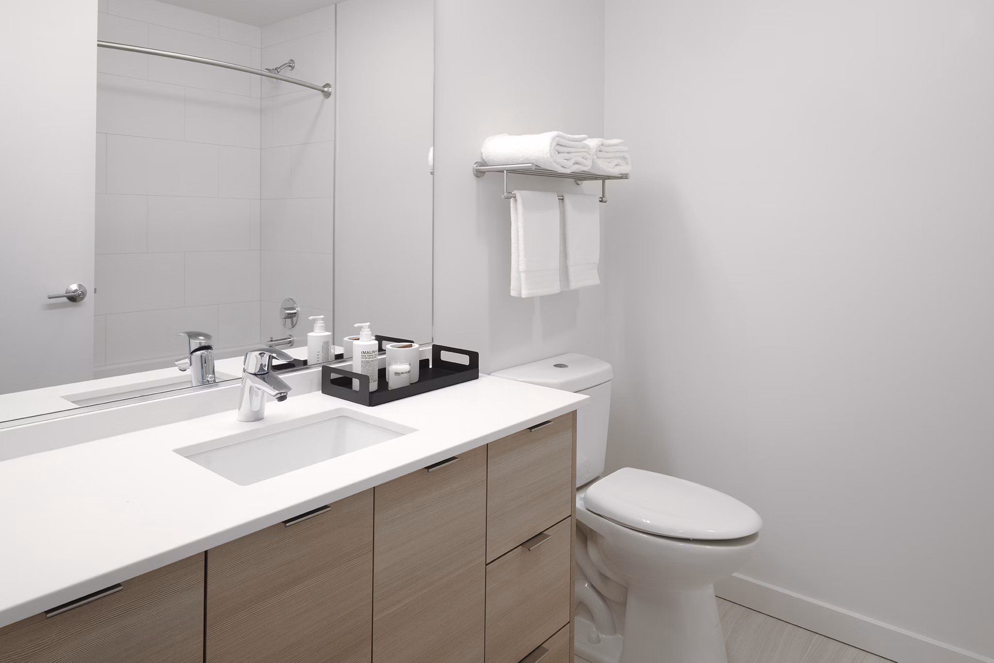 Bathroom with modern fixtures and sleek design at The Payton Apartments
