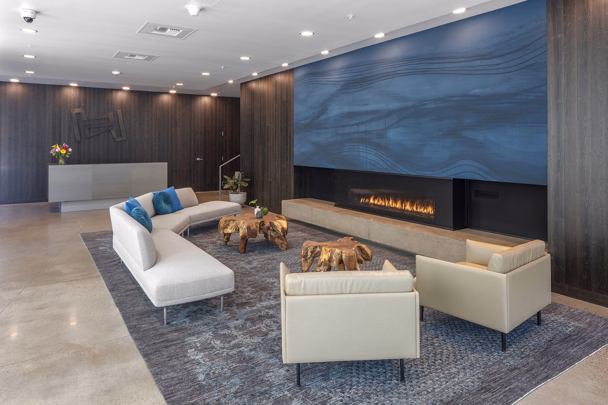 Modern clubhouse with stylish seating and billiards table at The Payton Apartments, offering luxury living in a vibrant community