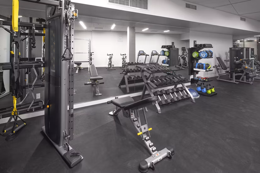 State-of-the-art fitness center with modern equipment at The Payton Apartments, ideal for maintaining an active lifestyle