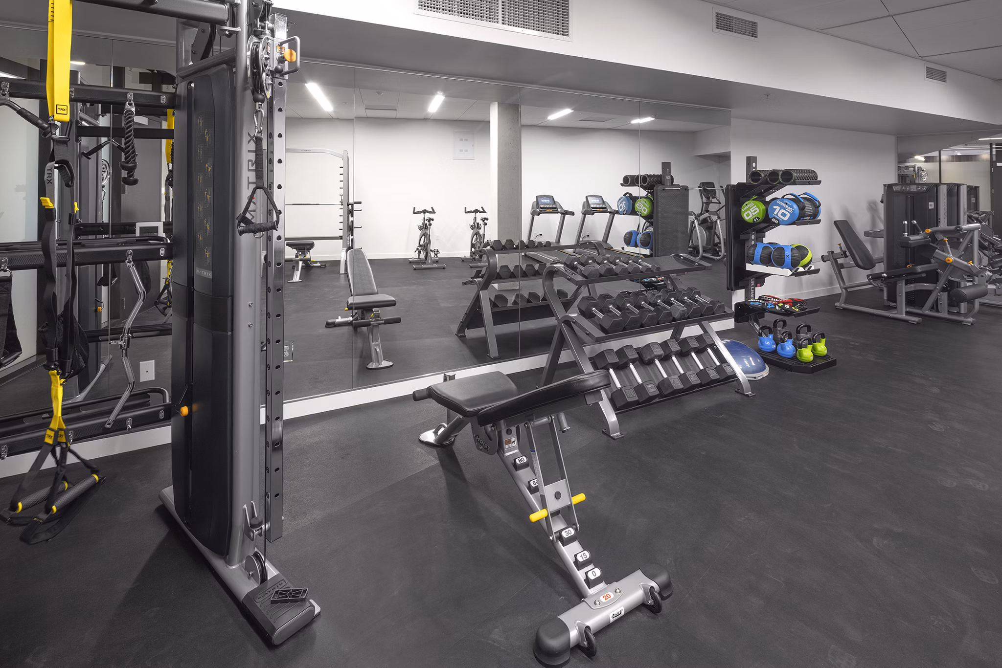 State-of-the-art fitness center with modern equipment at The Payton Apartments, ideal for maintaining an active lifestyle