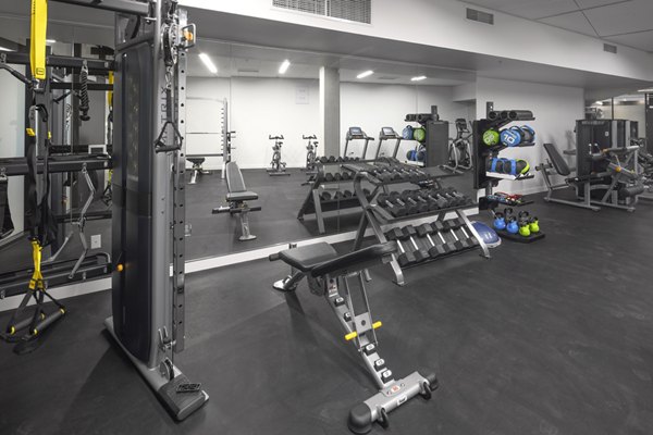 State-of-the-art fitness center with modern equipment at The Payton Apartments, ideal for maintaining an active lifestyle