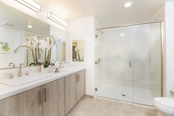 Bathroom featuring contemporary fixtures at One38 Apartments in downtown Bellevue