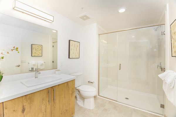 Modern bathroom with sleek fixtures at One38 Apartments, featuring luxurious design elements in a contemporary Seattle setting