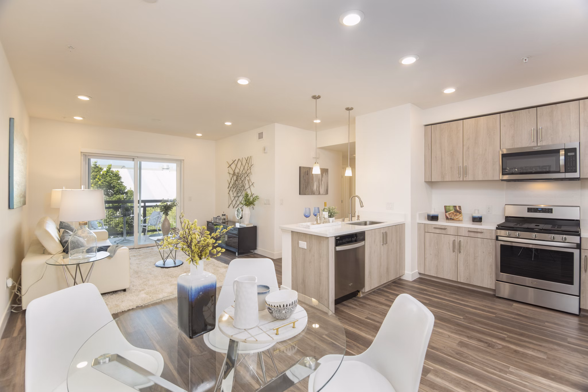 Dining area featuring elegant furnishings and modern lighting in One38 Apartments