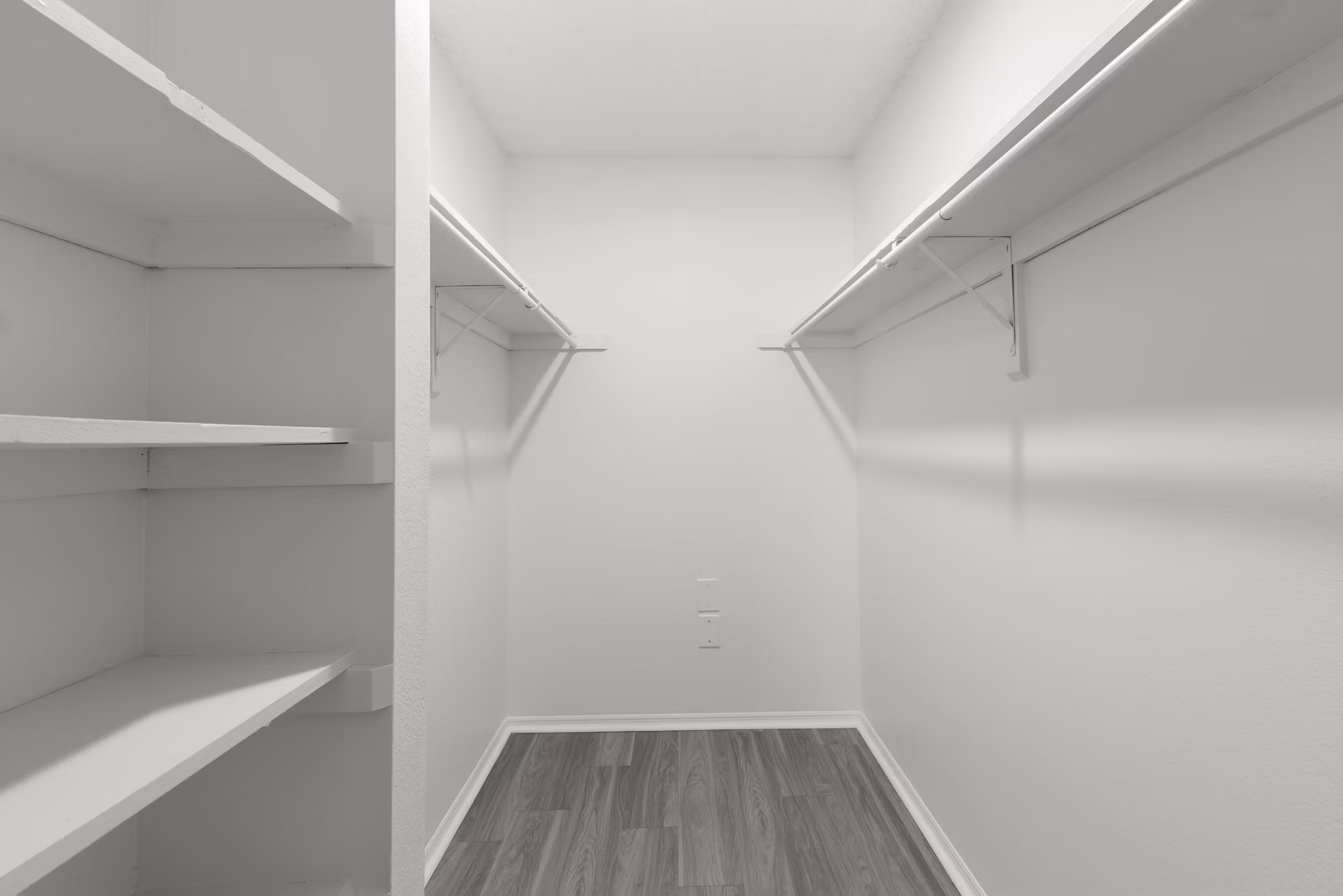 Spacious closet with ample shelving in Avana Coachman Apartments