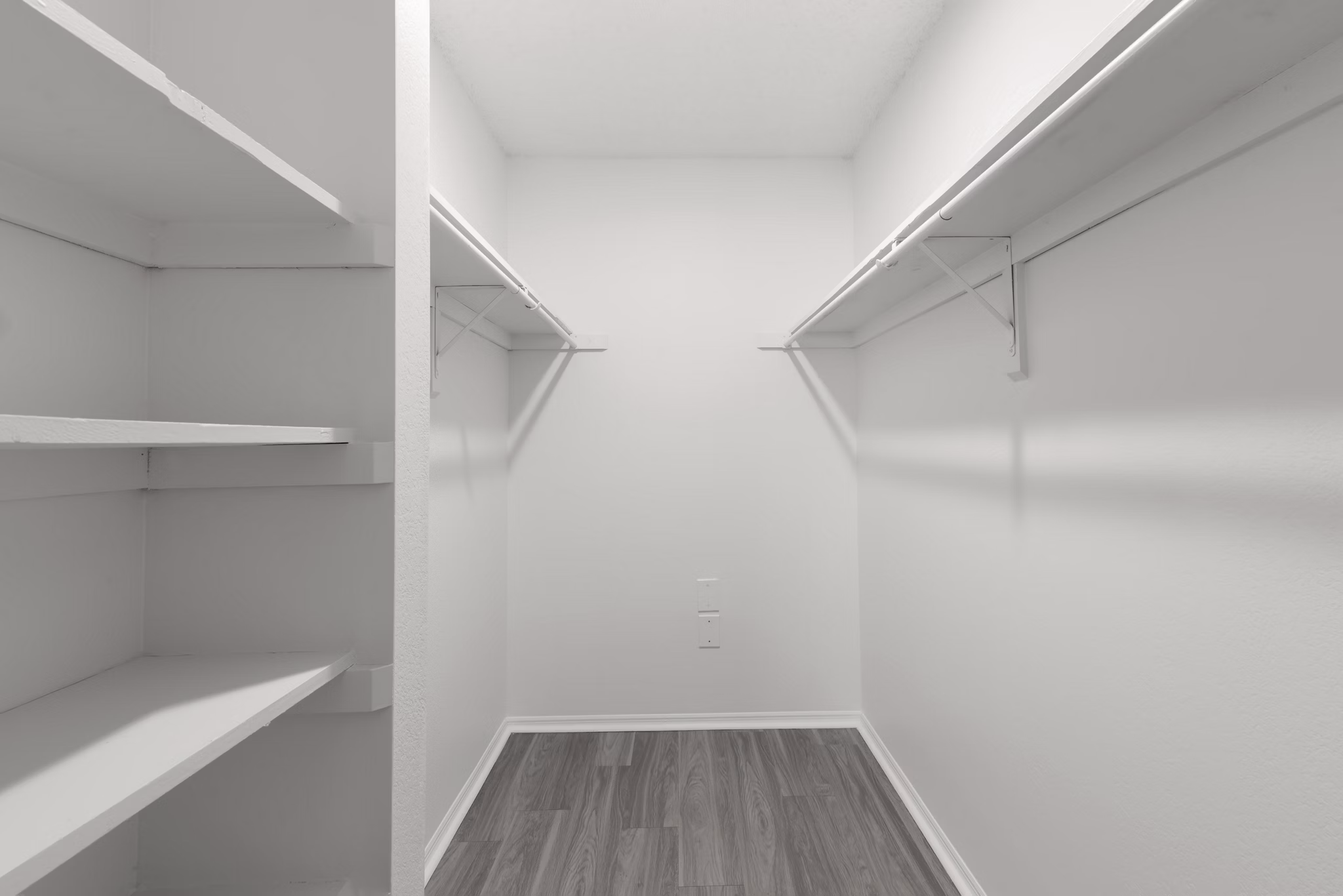 Spacious closet with ample shelving in Avana Coachman Apartments
