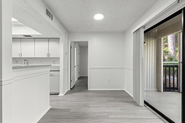 Elegant dining area with modern decor in Avana Coachman Apartments, offering a luxurious dining experience