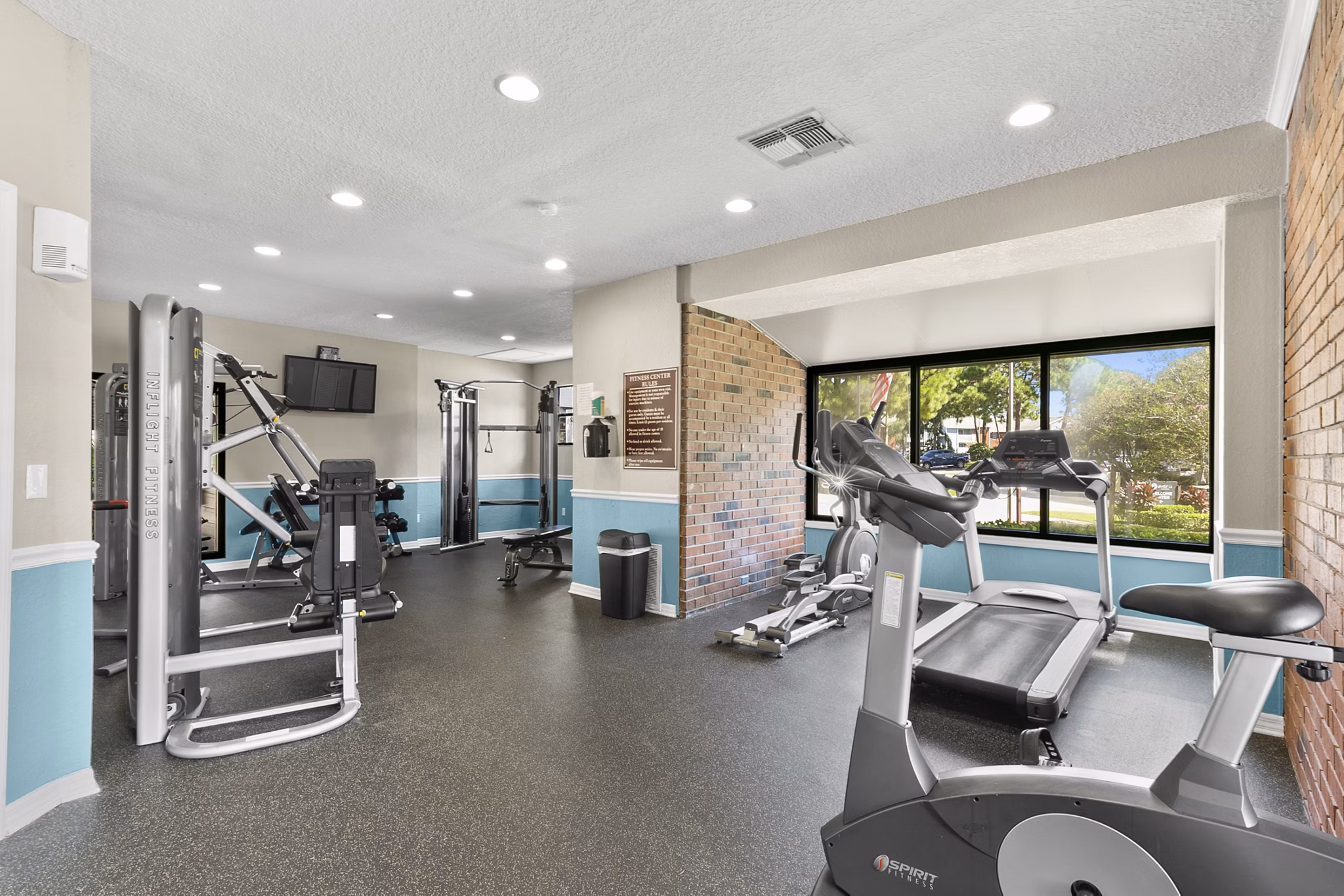 State-of-the-art fitness center with modern equipment at Avana Coachman Apartments, ideal for an active lifestyle