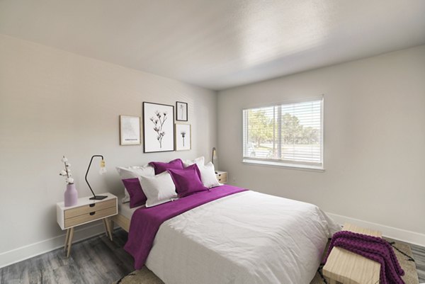 Cozy bedroom with modern dÃ©cor at Copper Terrace Apartments in a luxury setting