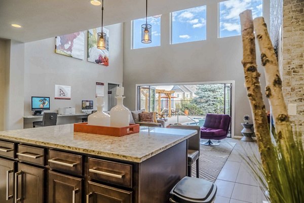 Clubhouse featuring modern design and cozy seating at Copper Terrace Apartments