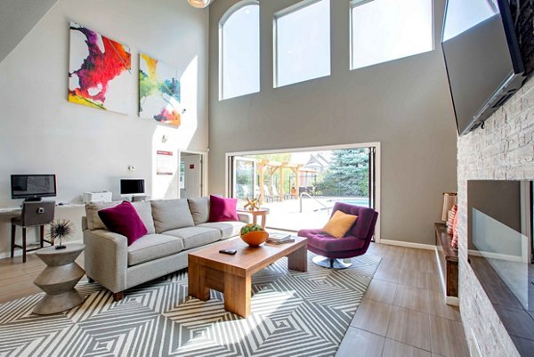 Modern clubhouse featuring sleek design and ample seating at Copper Terrace Apartments luxury community