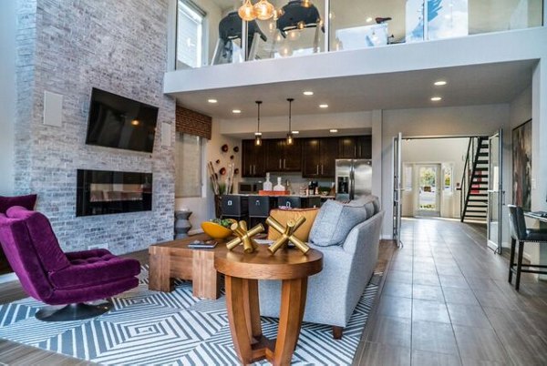 Clubhouse featuring modern design and plush seating at Copper Terrace Apartments, a luxury Greystar property