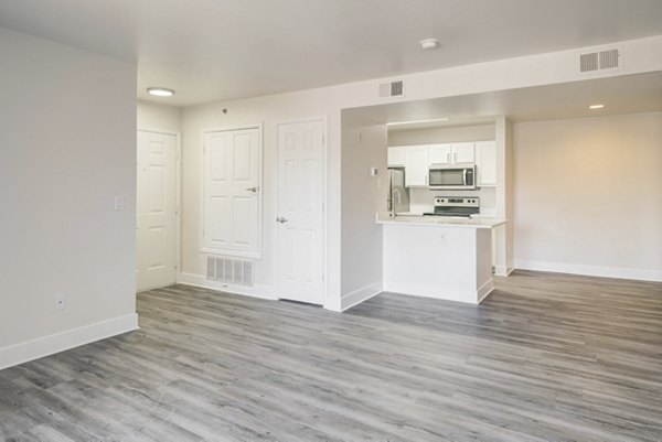 Spacious living room with modern decor at Copper Terrace Apartments