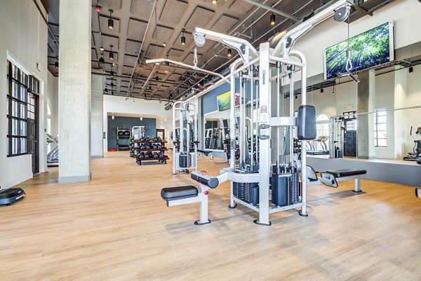 State-of-the-art fitness center with modern equipment at The Exchange at Bayfront Apartments