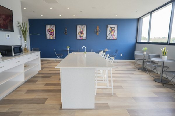 Clubhouse featuring modern design and leisure spaces at Cheatham Street Flats Apartments