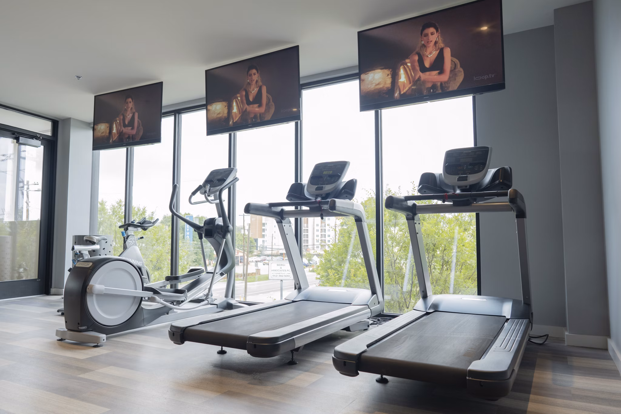 State-of-the-art fitness center with modern equipment at Cheatham Street Flats Apartments