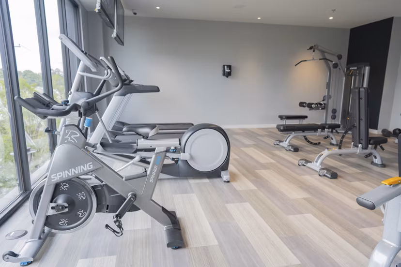 Fitness center with modern equipment at Cheatham Street Flats Apartments, perfect for residents seeking an active lifestyle