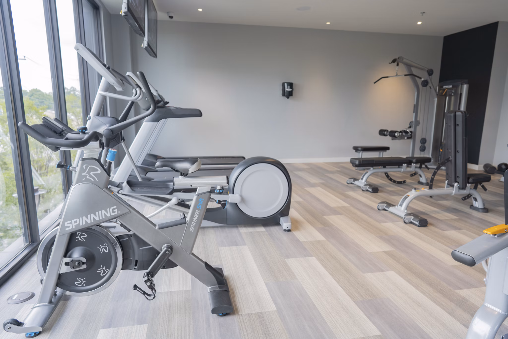 Fitness center with modern equipment at Cheatham Street Flats Apartments, perfect for residents seeking an active lifestyle