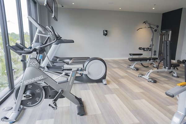 Fitness center with modern equipment at Cheatham Street Flats Apartments, perfect for residents seeking an active lifestyle
