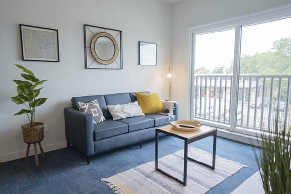 Modern living room with stylish furnishings at Cheatham Street Flats Apartments, luxury living space for relaxing and entertaining