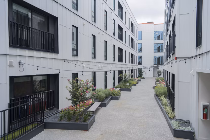 Courtyard featuring lush landscaping at Cheatham Street Flats Apartments
