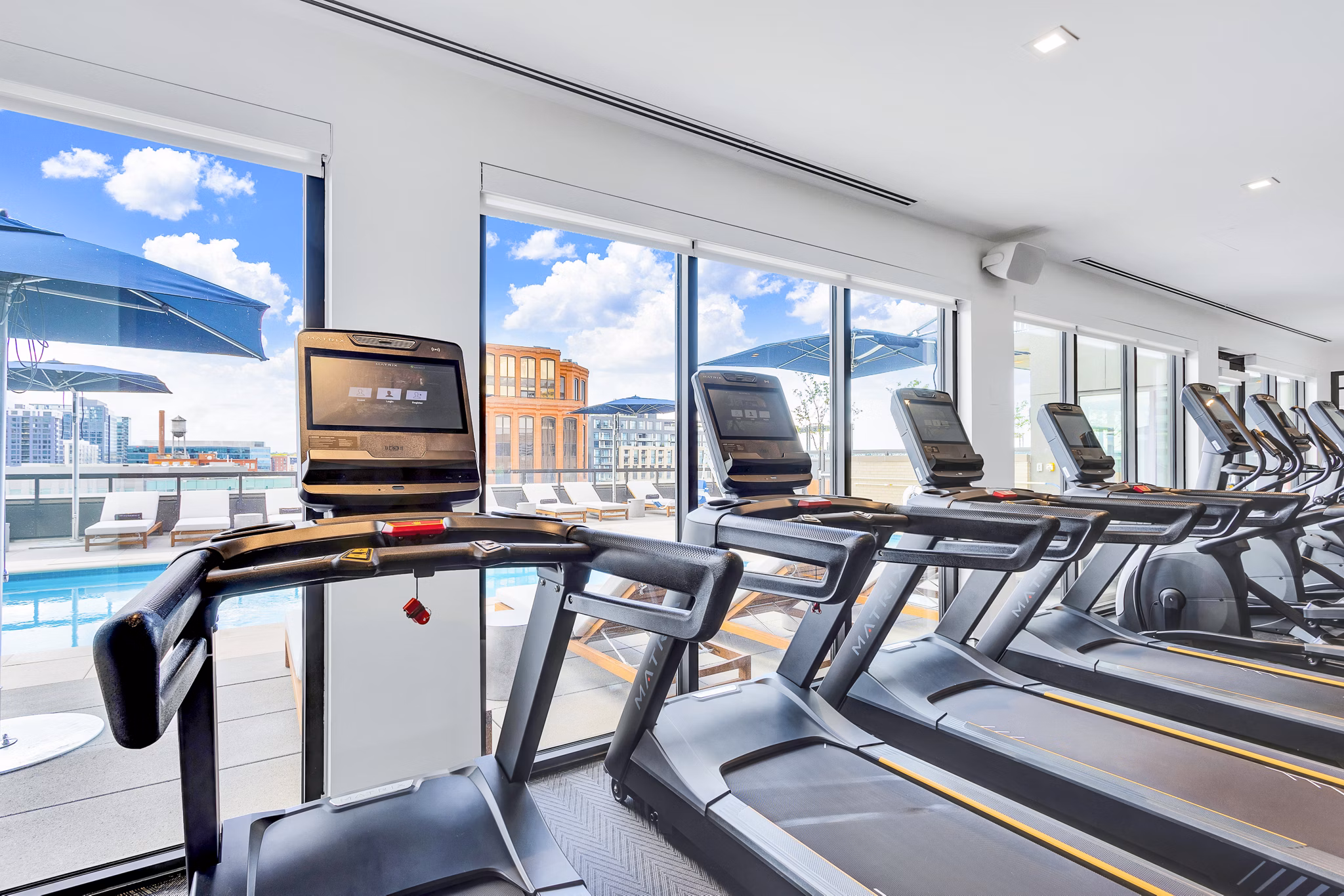 Modern fitness center with state-of-the-art equipment at The Fitzgerald Apartments