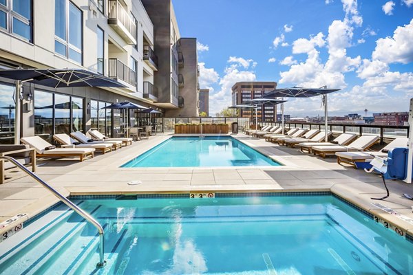 Elegant outdoor pool at The Fitzgerald Apartments offering luxury leisure experience