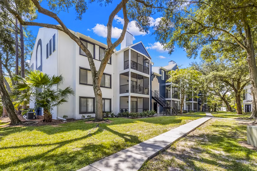 Avana Lakeview Apartments: Elegant building showcasing modern luxury apartments in a scenic lakefront setting