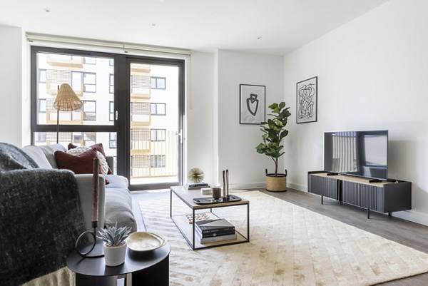 living room at Equipment Works Apartments
