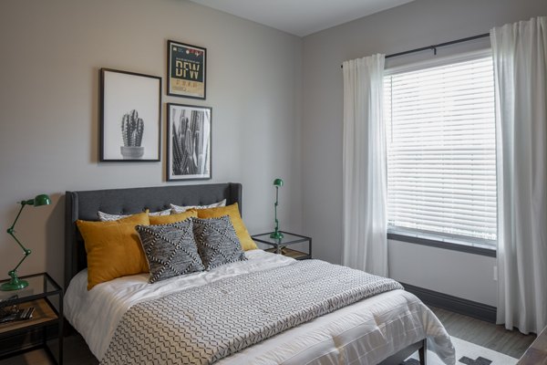 Cozy bedroom with modern decor at Westhouse Apartment Flats