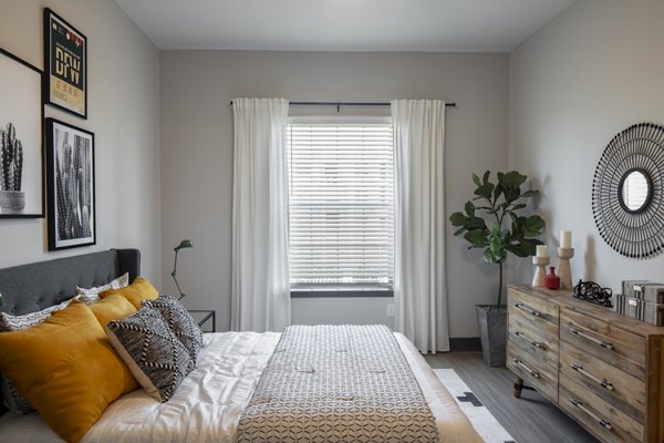 Bedroom featuring modern decor and ample natural light at Westhouse Apartment Flats luxury apartments