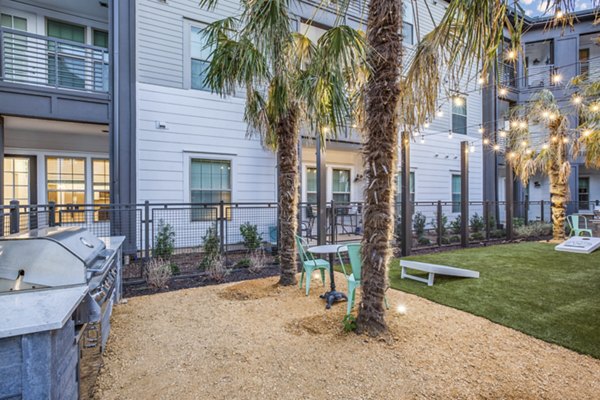 Modern grill area with stylish seating at Westhouse Apartment Flats