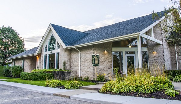 Clubhouse featuring modern design and cozy seating at Hidden Lakes Apartments