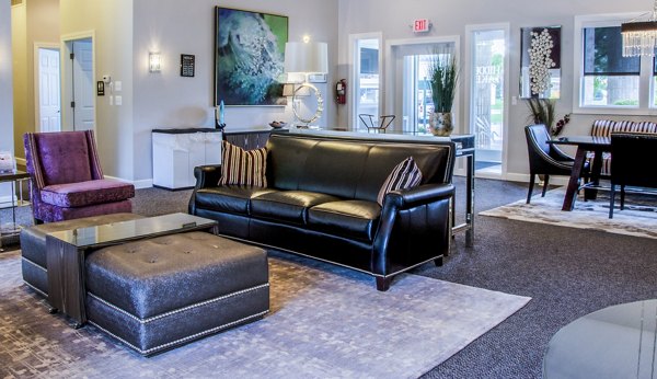 Clubhouse lobby with modern seating and decor at Hidden Lakes Apartments