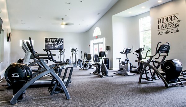 Modern fitness center with state-of-the-art equipment at Hidden Lakes Apartments