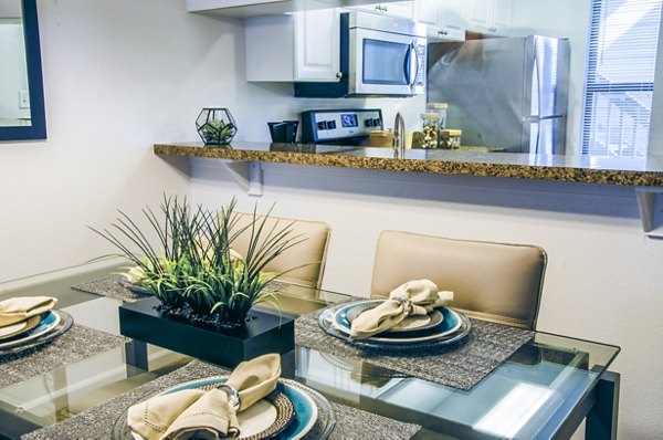 Dining room featuring modern decor and natural lighting in Laurel Valley Apartments