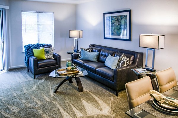 Spacious living room featuring elegant furnishings at Laurel Valley Apartments