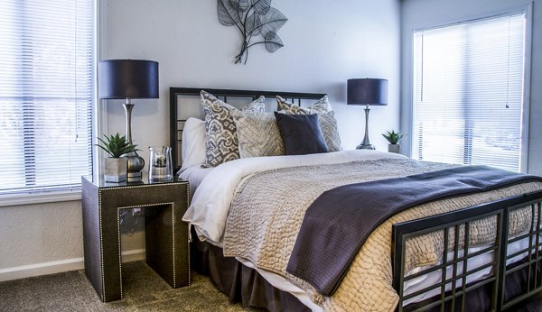 Bedroom featuring elegant design and modern decor in Oak Hill Apartments