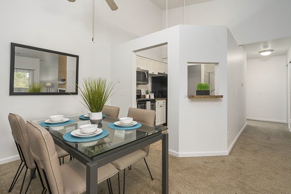 Dining area featuring modern fixtures and elegant decor at Shoal Creek Apartments, a Greystar luxury community