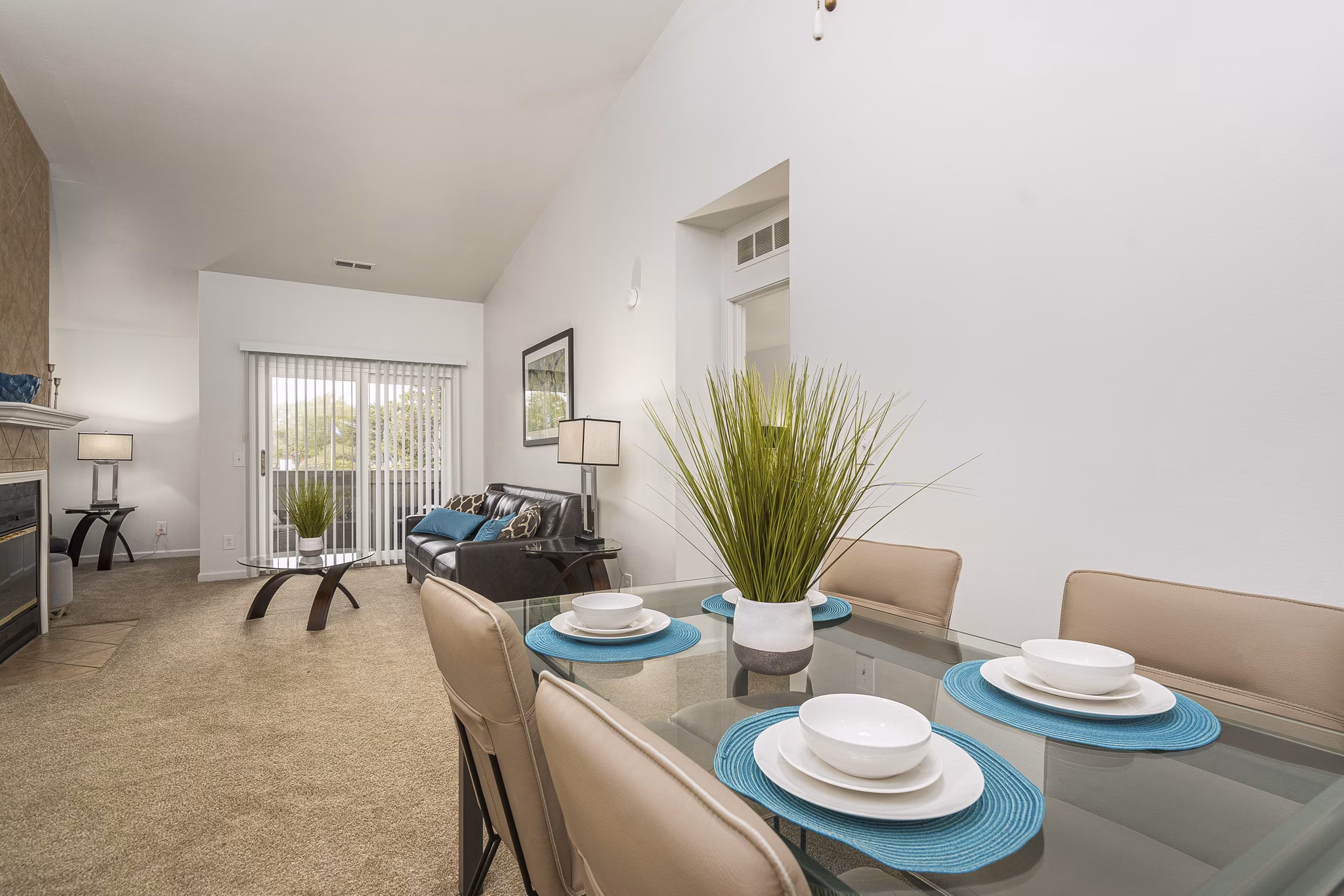 Dining area with modern furnishings at Shoal Creek Apartments, featuring sleek table and chairs, perfect for entertaining and comfort