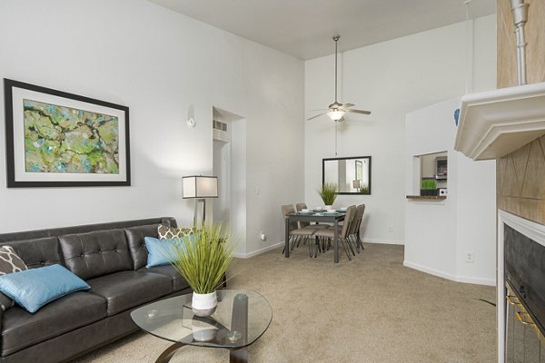 Spacious living room with modern decor at Shoal Creek Apartments, luxury community in a serene setting