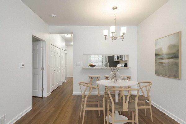 Modern dining area with elegant furnishings at Woodland Meadows Apartments