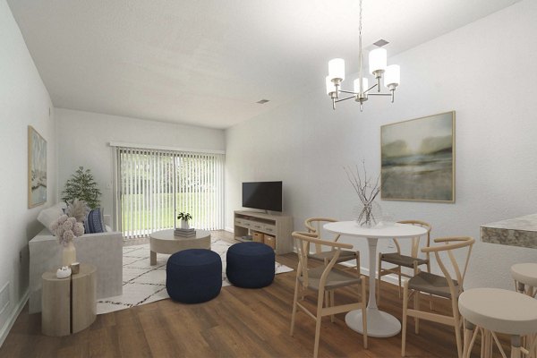 Modern kitchen with stainless steel appliances in Woodland Meadows luxury apartments