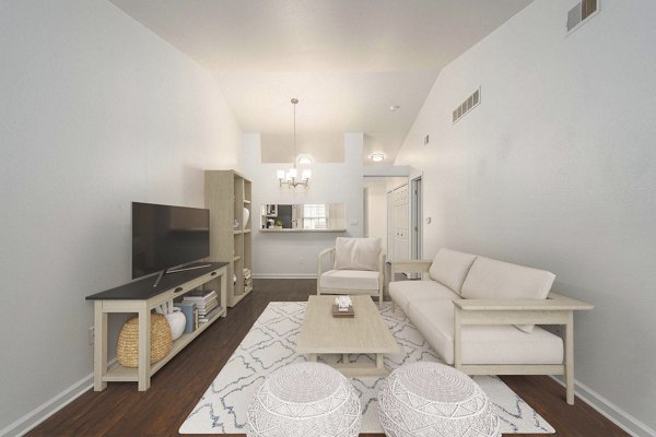 Spacious living room with modern furnishings at Woodland Meadows Apartments